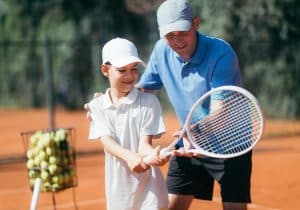 Tennis coach and player