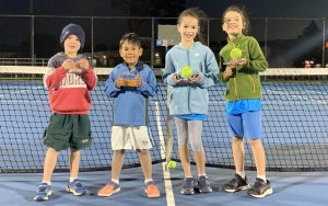 kids participating in beginner tennis