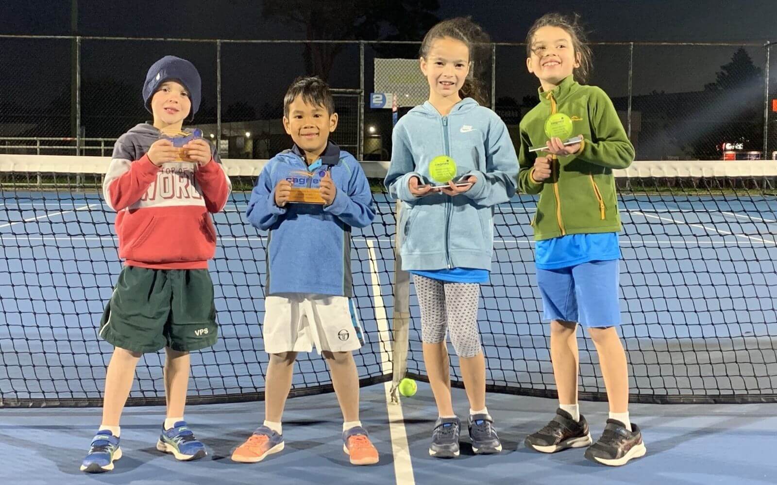 kids participating in beginner tennis